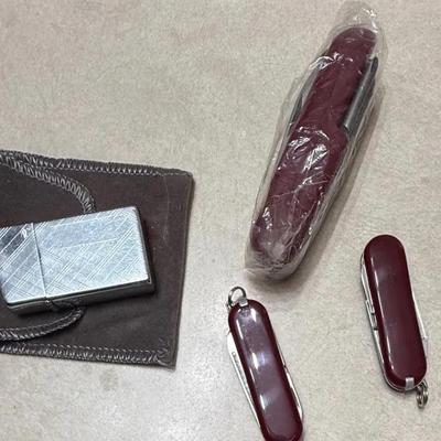 Zippo Lighter and Multiple Swiss Army Knives