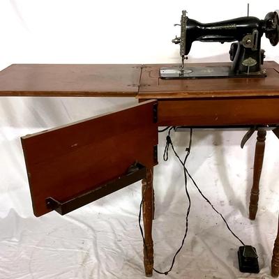 “Admiral” Sewing Machine in a Cabinet 