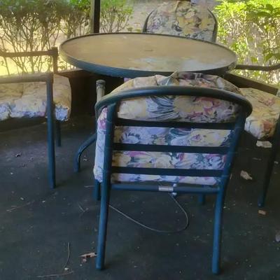 Patio Table with Four Cushioned Chairs