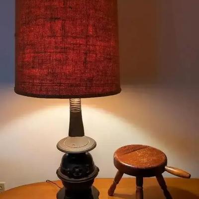Pot Belly Stove-Inspired Metal Lamp with Rustic Shade and Wooden Milk Stool
