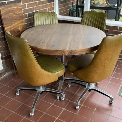 Mid-Century Modern Round Dining Table with Leaf and Four Swivel Chairs