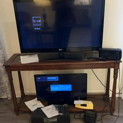 LG and Samsung TVs with Sony Cassette Player and GE Clock Radio