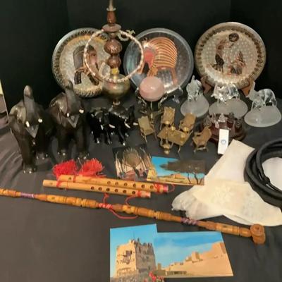 Middle Eastern-Inspired Décor with Brass Water Pipe and Elephant Figurines