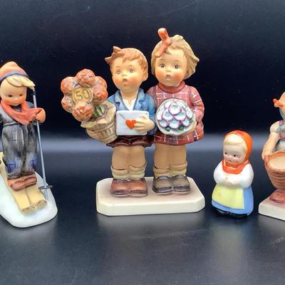 Four Hummel Figurines