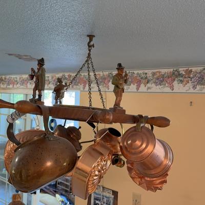 Vintage Carved Wood Hanging Pot Rack with Copper Molds and Figures

