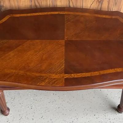 Cherry wood oval coffee table 