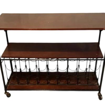Wooden Cart With Wine Bottle Holders At The Bottom With Wheels
