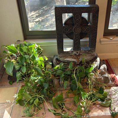 Water Fountain And Potted Plant