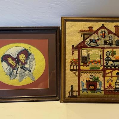 Framed needlepoint artwork featuring a butterfly & Needlepoint Dollhouse
