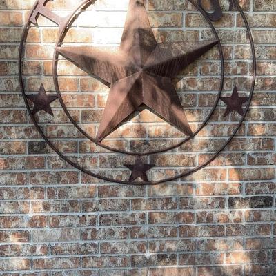 Rustic bronze metal Texas barn star and circle wall decor. 