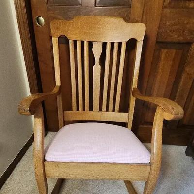 Wooden Rocker With Pink Checkered Upholstery 