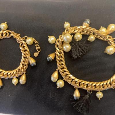 Pair of contemporary Cabi gold-tone charm bracelets with pearls and tassels