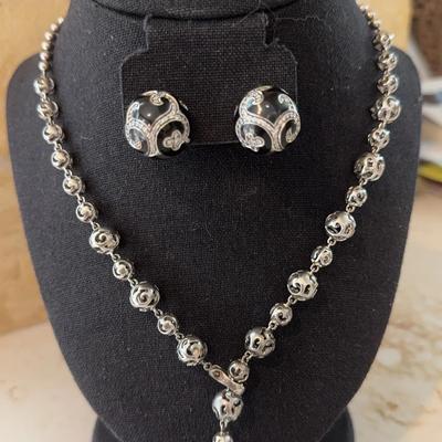 Belle Étoile pendant necklace and ring featuring enamel and sterling silver