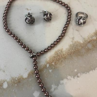 Belle Étoile lariat necklace and matching ring/earrfeaturing rose-colored beads and a pearl-like orb