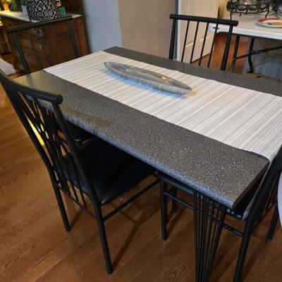 Iron chairs and base breakfast table