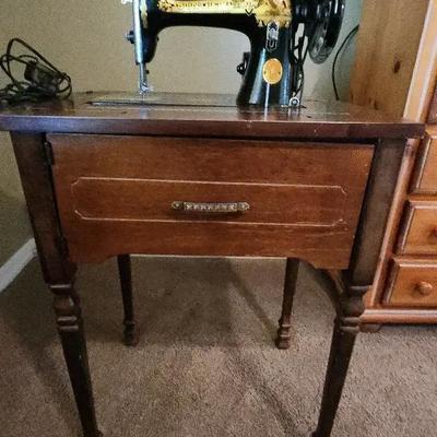 Antique Singer Sewing Machine - Sphinx Decal Pattern in Wooden Cabinet