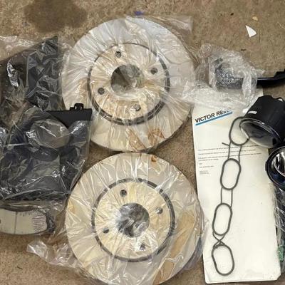 EAT298 Two Brake Rotors, 4 brake Pads, Fog Lights, And A Victor Reinz gasket set