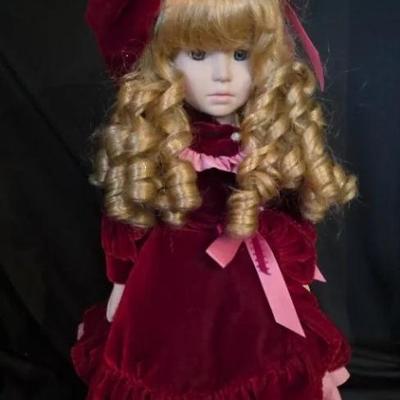 EAT310 - 17" Porcelain Doll In Red Satin