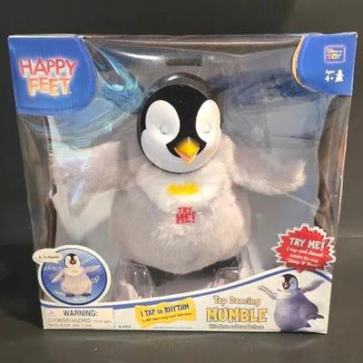 Vintage Thinkway Toys "Happy Feet Tap Dancing Mumble" plush toy. 