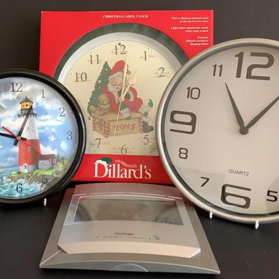 Clock Assortment Including “Atomic Clock” And “Christmas Carol” Clock