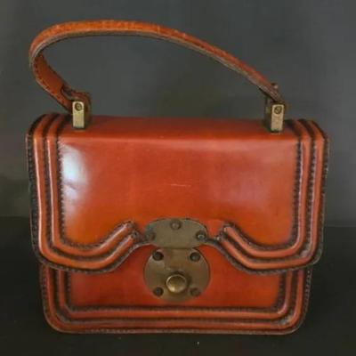 Vintage Hand-Tooled Brown Leather Purse With A Brass Clasp.