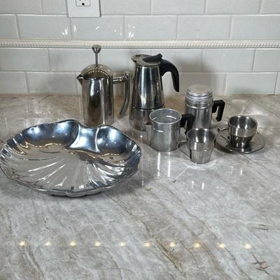 (6pc) Miscellaneous Silver Tone Dish And Coffee Accessories | Including but not limited to cup and saucer, French Press, and Scallop low...