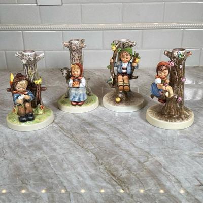 (4pc) Tree-trunk Hummel Figurines | Dimensions: h. 6.75 in

