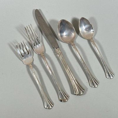 REED & BARTON STERLING SILVER FLATWARE SERVICE | Comprising: 12 dinner forks, 12 steel-blade dinner knives, 12 tablespoons, 12...