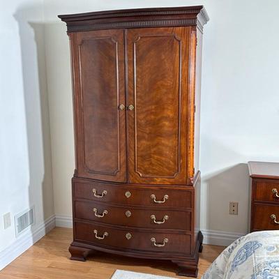 Chippendale Style Armoire By Baker Furniture | Includes 3 drawers with brass handles, two doors that open up to and additional two...