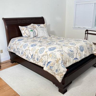 Queen Bed Frame By Henkel Harris | Has tall headboard with clamshell and scroll embellishment and large footing. Dark wood. Dimensions:...