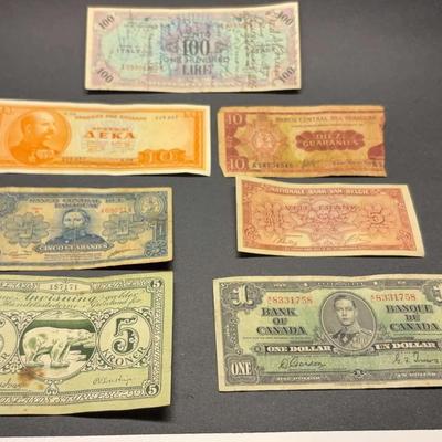 AZ020J Currency From Around The Globe 