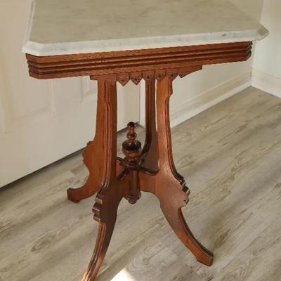 Marble Marvel: Exquisite Victorian Parlor Table With Ornate Craftsmanship