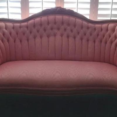 Sophisticated Settee With Regal Rose-Tone Tufted Seating Surface