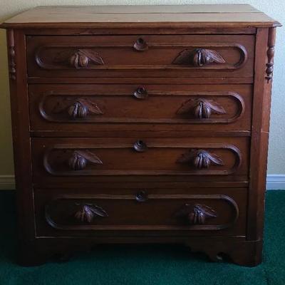 Draw Some Attention: Exquisite Hand-Carved Dresser