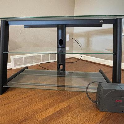 Glass Top TV Stand with Surge Protector – Modern & Functional