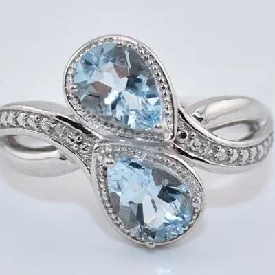 1.7 TCW Natural Pear Blue Topaz Sterling Silver Ring