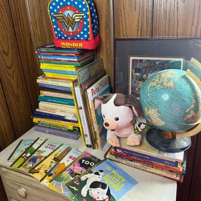 Collection Of Children’s Books With Globe