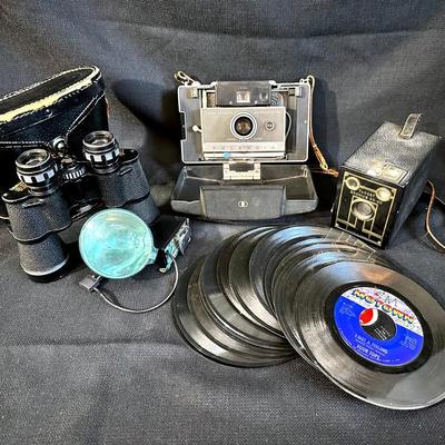 Vintage Polaroid Camera, Tasco Binoculars, Vinyl 45’s & More