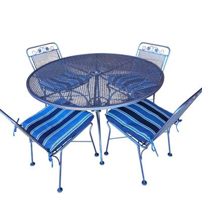 Lot #56 - Blue Metal Patio Table and Four Chairs With Chair Pads