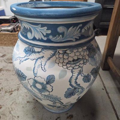 Lot #119 - Blue and White Painted Planter With Handpainted Florals Capped in a Sky Blue Trim of Ornate Scrollwork