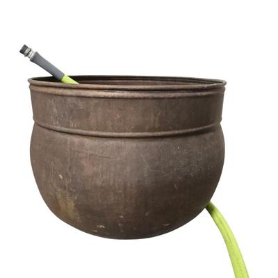 Lot #103 - Rustic Metal Hose Holder With Hose