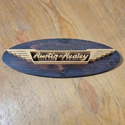 Lot #180 - Hand Carved Wood Austin-Healey England Bonnet Badge