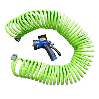 Lot #105 - Coiled Garden Hose With New Spray Nozzle