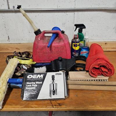 Lot #179 - Car Care - Steering Wheel Lock Plate Remover, Cleaning Supplies, Ratchet Tie Down Straps, Gas Can