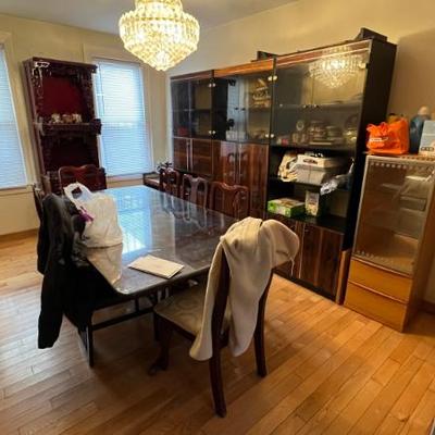 Dining table and chairs. Display cabinets 