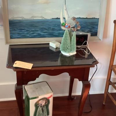 $90 side table with glass top 26"H 26"W 19"depth 