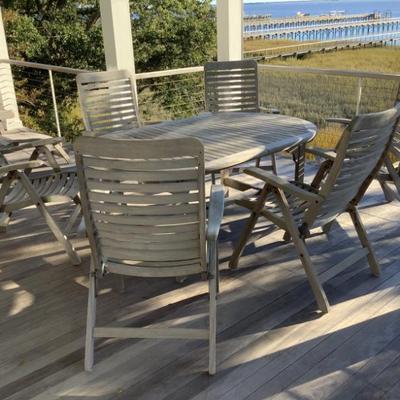 $1195 teak table with 6 chairs-table 28"H 70"L 42"W 