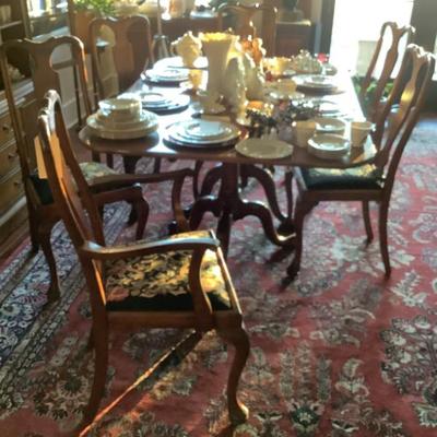 $495 solid wood chairs with needlepoint 2 capts and 4 sides (2 sets in this sale) 39”H 24”W 24”depth