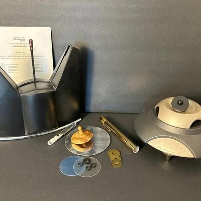 Desktop Gadgets: Fantazein Programmable Message Clock, Levitron Gravity Defying Spinning Top, More