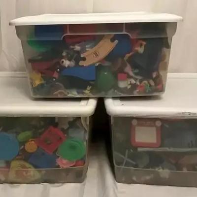 Three Storage Bins Filled with Toys